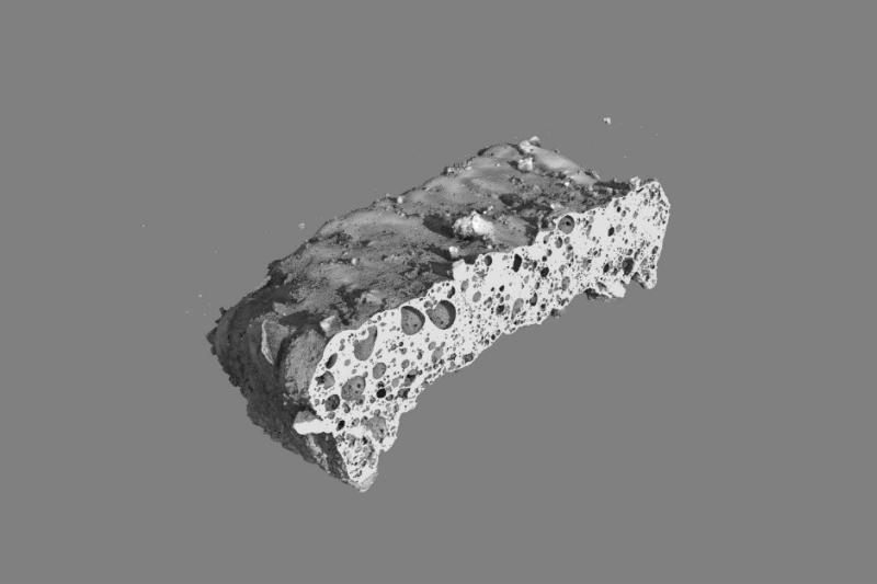 Ein Bild aus dem CT einer Regolithprobe mit vielen Poren.